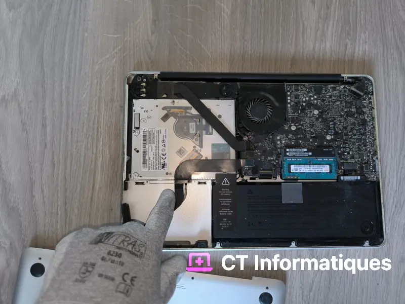 Réparation macbook avec changement de disque dur et batterie